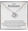 Lifestyle Gear, LLC's Love Knot Necklace - A symbol of unbreakable love featuring a beautiful pendant with cubic zirconia crystals. Available in 14k white gold or 18k yellow gold over stainless steel, with an adjustable chain and lobster clasp for a perfect fit.