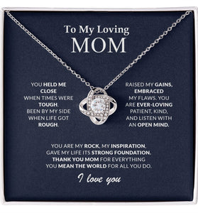 Lifestyle Gear, LLC's Love Knot Necklace for Mom - Elegant design with premium cubic zirconia crystals. Available in 14k white gold or 18k yellow gold. Adjustable chain with lobster clasp for a secure and stylish fit. Timeless elegance for a thoughtful gift.
