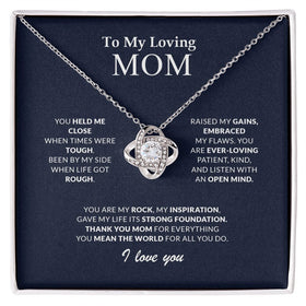 Lifestyle Gear, LLC's Love Knot Necklace for Mom - Elegant design with premium cubic zirconia crystals. Available in 14k white gold or 18k yellow gold. Adjustable chain with lobster clasp for a secure and stylish fit. Timeless elegance for a thoughtful gift.