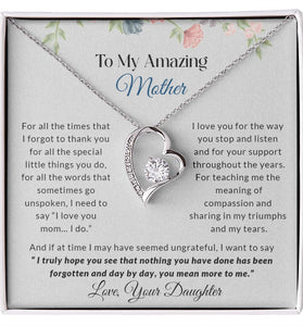 Lifestyle Gear, LLC's Forever Love Necklace - A stunning CZ crystal pendant surrounded by smaller crystals, available in 14k white gold or 18k yellow gold finish. The perfect gift to express love to your amazing mother.