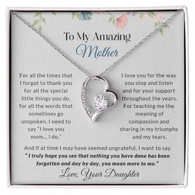 Lifestyle Gear, LLC's Forever Love Necklace - A stunning CZ crystal pendant surrounded by smaller crystals, available in 14k white gold or 18k yellow gold finish. The perfect gift to express love to your amazing mother.